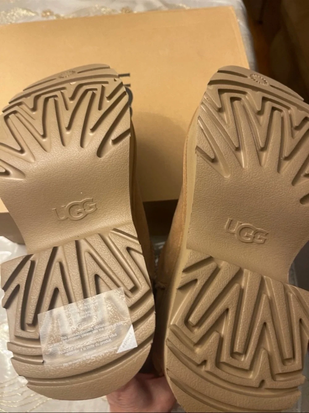 UGG Women's classic short new heights bootie’s size 7